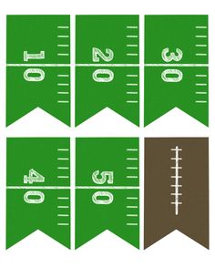 four green and brown pennants with numbers on them, one for each football team