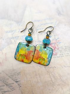 Entirely handcrafted in my Wisconsin home studio. Colorful abstract painterly images have been fired onto a yellow enamel surface. The back is also a light yellow color. OOAK beautiful earrings Light Yellow Color, Artisan Bracelets, Short Necklace, How To Make Earrings, Colorful Abstract, Beautiful Earrings, Wisconsin, Jewelry Earrings Dangle, Really Cool Stuff