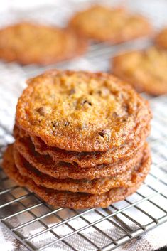 a stack of cookies sitting on top of a cooling rack