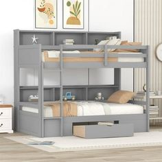 a bunk bed with drawers underneath it in a room