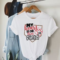 a t - shirt that says my heart is on that field