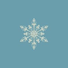 a white snowflake on a blue background