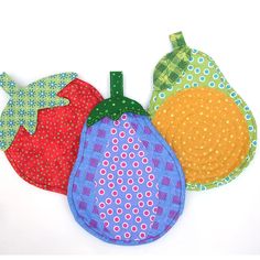 three pieces of fabric with the words happy patterns written on them and an image of four apples