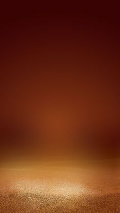 an orange and brown background with some light