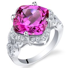 7.50 Carat Created Pink Sapphire Sterling Silver Cushion Halo Ring Sizes 5 to 9 SR11744 Pink Sapphire Jewelry, Sapphire Halo Ring, Jewelry Questions, Classic Solitaire Ring, Silver Cushions, Purple Sapphire, Round Stud Earrings, Halo Ring, Halo Rings