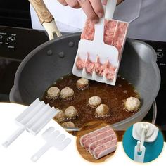 a person cooking meat in a frying pan with spatulas on the side