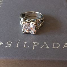 I Have 2 Silpada Sterling Silver Uptown Ring. In Great Condition Except There Are Some Scratches On The Back Side Of Ring. (Shown In Picture) Very Popular Ring And So Gorgeous. Size 8 And 9 Silver Cubic Zirconia Clip-on Jewelry, Luxury Silver Cubic Zirconia Bypass Ring, Silver Tarnish-resistant Cubic Zirconia Rings, Silpada Jewelry Bracelets, Silver-plated Cubic Zirconia Earrings, Silpada Jewelry, Popular Rings, Womens Jewelry Rings, Women Jewelry