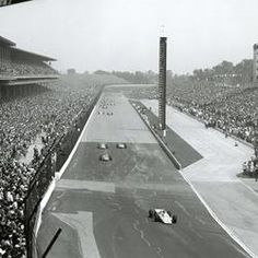 a black and white photo of a race track