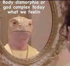 a woman looking in the mirror at a strange creature's face with its tongue sticking out