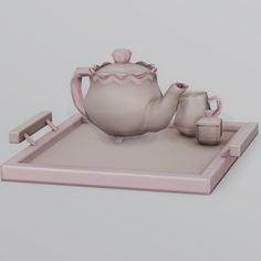 a tea pot and two cups on a tray