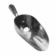 a black and white photo of a spoon with a dog in it