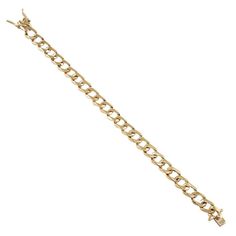 DESCRIPTION: This finely detailed gold curb bracelet is crafted in lustrous 14K yellow gold. The frame measures 8.5 Inches in length and 9 mm in width. The bracelet weight is 20 grams. This exquisite unisex bracelet securely locks with a durable open box clasp. DETAILS: Item Code 99391 Metal Color Yellow Metal Type 14K Gold Item Weight Based on Bracelet Length Width 9 mm Box Clasp, Unisex Bracelets, Open Box, Metal Color, Yellow Color, Link Bracelets, Types Of Metal, Yellow Gold, Bracelet