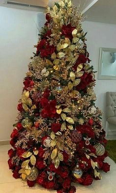 a christmas tree with red and gold decorations