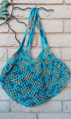 This is a beautifully fun crocheted giant summer beach bag! I know you will enjoy this as much as I did making it!  It is made with 100% cotton.  It will last forever! Custom made to order you can choose from any of your favorite lily sugars n cream mixed colors! Crochet Yarn Beach Bags, Crochet Cotton Beach Bag, Cotton Crochet Beach Bag, Cotton Crochet Bag For The Beach, Crochet Cotton Bag For Beach, Cotton Crochet Bag For Beach, Handmade Crochet Bag For The Beach In Summer, Beach Bags With Crochet Details, Hand Knitted Yarn Crochet Bag For Beach