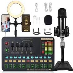 a microphone and sound board set up for recording with headphones, mics, lights, and other accessories