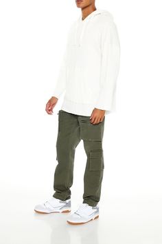 Pair of twill joggers featuring mid - rise drawstring waist, slanted front pockets, leg flap and zippered cargo pockets, back patch pockets, and slim fit. | 98% cotton, 2% spandex | Machine wash cold | Model is 6'1" and wearing Medium | Men Slim - Fit Mid - Rise Cargo Joggers Urban Cotton Cargo Pants With Multiple Pockets, Urban Style Cotton Cargo Pants With Side Pockets, Casual Cotton Cargo Jeans With Patch Pockets, Urban Cotton Cargo Pants With Side Pockets, Urban Cotton Parachute Pants With Flap Pockets, Cotton Parachute Pants With Flap Pockets For Streetwear, Relaxed Fit Cargo Pants With Patch Pockets For Streetwear, Urban Cotton Cargo Pants, White Cargo Pants With Hip Pockets For Streetwear