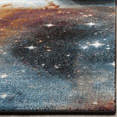 an area rug with stars on the ground