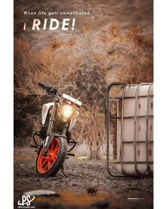 a motorcycle parked next to a metal container with the words ride on it's side