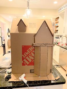 an open cardboard box sitting on top of a counter