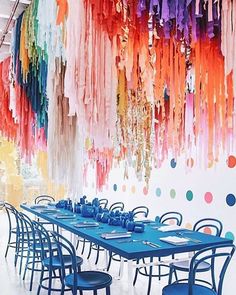 the instagram page for an art gallery with colorful streamers hanging from the ceiling