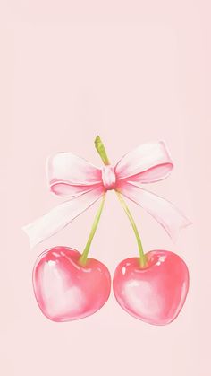 two cherries tied with a bow on top of each other against a pink background