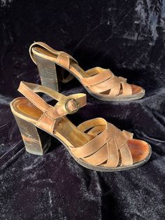 Vintage 1970s stacked heel strappy leather sandals high heels. Normal wear for their age women's size 7 Vintage High Heel Sandals For Summer, Vintage Open Toe Sandals With Buckle, Vintage Open Toe Sandals With Buckle Closure, Vintage Heels With Heel Strap, Vintage Open Heel Sandals For Summer, Vintage Leather Sandals For Spring, Vintage Summer Heels With Block Heel, Vintage Buckle Closure Sandals For Spring, Vintage Block Heel Heels For Summer