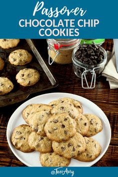 chocolate chip cookies on a white plate next to cookie tins