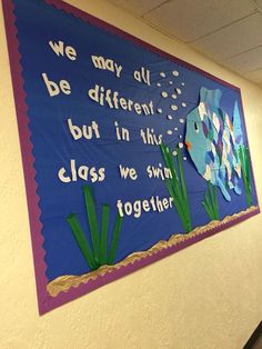 a bulletin board that says we may all be different but in this class we swim together