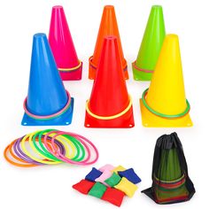 a bunch of colorful plastic cones and rings