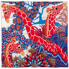 two giraffes are in the middle of a floral design with blue and red colors