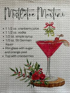 a recipe for mistlet martini on a towel