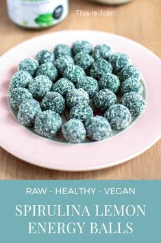 raw, healthy vegan spiruina lemon energy balls on a pink plate