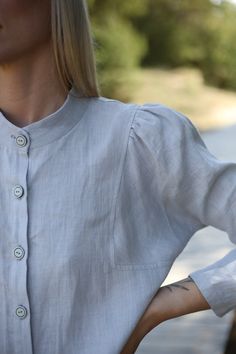 "Dress with puffed sleeves. Linen shirt dress. With buttons and pockets on the front. The model wearing size S, 172 cm/5'7\" tall. COLOR: Light gray 100% Lithuanian linen, one of the finest in Europe GARMENTS ARE DESIGNED FOR 164-176 CM HEIGHT ( 5'5\"-5'9\") PLEASE LEAVE A NOTE WITH YOUR ORDER, IF YOUR HEIGHT DOES NOT FALL IN THIS RANGE. SIZE GUIDE Body measurements: in cm / inch: XXS bust: 79-82 cm (30-32\") waist: 62-64 cm (24\"-25\") hips: 84-88 cm (33\"-34\") XS bust: 84-88 cm (33\"-34\") wa Shirt Pocket Designs, Linen Dresses Elegant, Linen Garments, Linen Summer Outfits, Linen Shirt Women, Linen Style Fashion, Dress With Puffed Sleeves, Sewing Blouses, Linen Shirts Women