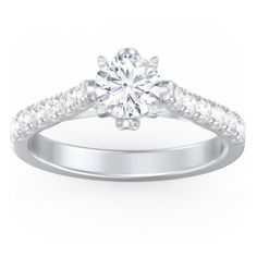 a white gold engagement ring with diamonds on it