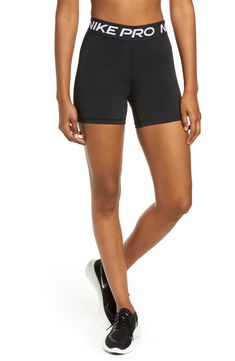 Free shipping and returns on Nike Pro 365 Performance Shorts at Nordstrom.ca. A second-skin fit allows full-range motion in sleek performance shorts that have a stay-put waistband and flattering seams at the back. Nike Slides, Nike Pros, Bike Shorts, Second Skin, Athletic Shorts, Dri Fit, Womens Bottoms, Clothing Items, Nike Women