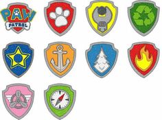 a bunch of badges with different designs on them