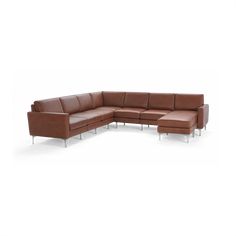 a brown leather sectional sofa with wooden legs