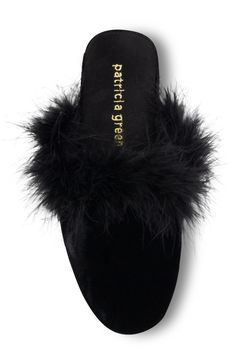 Crafted from rich velvet with feather trim, this luxe slipper boasts a playful fusion of cozy and glamorous. 3/4" heel Cushioned footbed Textile upper and lining/rubber sole Imported Slippers Product Photography, Velvet Slippers, Slippers Black, Stylish Work Attire, Feather Trim, Shoe Inspo, Black Feathers, Comfy Shoes, House Shoes