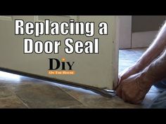 a man is repairing a door seal on the floor