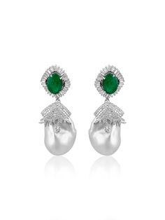 Delivery in 3-5 business days Need it faster? Text us at (619) 247.5731 or Call us at (619) 365.4736 ﻿This pair of earrings are perfect for special occasions, this design gives the piece a feminine touch. Diamonds: 4.50 ct Emerald: 4.66 ct Pearl Barroque: 88.20 ct Silver with Rhodium Plated weight: 10.15 grams Gold Post: 0.15 grams Luxury Baguette Diamond Earrings For Formal Events, Luxury Drop Cluster Earrings For Evening, Luxury Cluster Drop Earrings For Evening Occasions, Luxury Cluster Drop Earrings For Evening, Evening Baguette Diamond Drop Earrings, Baguette Earring, Earrings Diamonds, Pearl And Diamond Earrings, Baguette Diamond