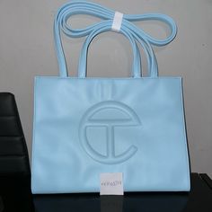 Telfar Shopping Bag Brand New Medium Pool Blue Shopping Bag Comes With Dust Bag Sold Out Price Is Firm No Free Shipping #Palmangels #Telfar #Bag #Hat #Shirt Blue Telfar Bag, Telfar Bags Medium, Telfar Shopping Bag, Sky Blue Outfit, Telfar Bags, Branded Shopping Bags, Telfar Bag, Pool Blue, Blue Outfit