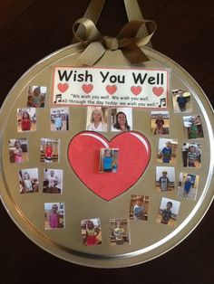 a round metal plate with pictures on it and a ribbon hanging from the top that says, wish you well