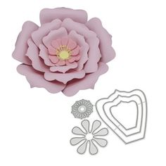 a paper flower and die set on a white background