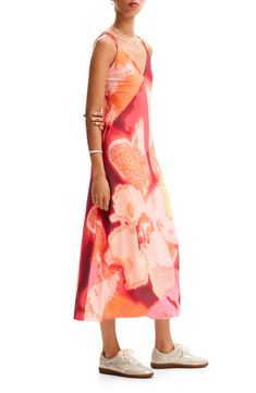 An abstract pattern with washed-out blooms brightens your day every time you choose this flowy slipdress with strappy details. Slips on over head Deep V-neck Adjustable straps 94% polyester, 6% elastane Machine wash, line dry Imported Casual Halter Neck Slip Dress For Spring, Floral Print Summer Slip Dress, Casual Floral Print Slip Dress For Summer, Casual Summer Floral Print Slip Dress, Casual Summer Slip Dress With Floral Print, Casual Flowy Slip Dress For Vacation, Casual Floral Print Slip Dress For Spring, Pink Halter Neck Slip Dress For Summer, Casual Slip Dress For Vacation In Spring