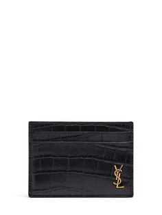 Height: 7.5cm Width: 10.5cm. Front gold-colored metal logo detail. All over embossed pattern placement may vary. 4 Card slots. 1 Central slot Ysl Document Holder, Saint Laurent Invitation, Leather Cardholder, Leather Card Holder, Crossbody Messenger Bag, Work Bags, Metal Logo, Saint Laurent Bag, Logo Stamp