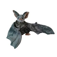 a stuffed animal bat is flying through the air