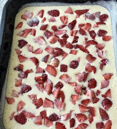 a pan filled with strawberries and cream