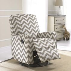 a living room with a chair that has a chevron pattern on it