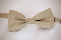 This trendy and stylish bow tie is great for so many occasions!Bow tie made of 100% cotton with a matching, adjustable neck strap. Style:• The Pre-Tied Bow Tie• The Clip-On Bow TieAll our bow ties can be made in the following sizes, just specify which size you need in a note at checkout: Sizes:Baby: 3.5" x 2"Kids: 4" x 2"Youth:  4.25" x 2.25Adult: 5" x 2.5"All our bow ties are made by hand; therefore, measurements are a guideline only and cannot be guaranteed. Neck strap sizes:Baby – adjustable Dapper Detachable Bow Tie For Weddings, Dapper Bow Tie With Detachable Bow For Weddings, Dapper Wedding Bow Tie With Detachable Bow, Dapper Bow With Butterfly Knot For Wedding, Dapper Butterfly Knot Bow For Wedding, Wedding Ties With Butterfly Knot, Wedding Ties With Detachable Bow, Classic Brown Bow Tie For Wedding, Dapper Detachable Bow For Wedding