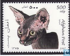 a postage stamp with an image of a cat on it's front and side